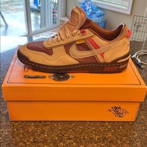 Nike Men's Beige and Brown Low-Top Sneakers with Red Accents union la